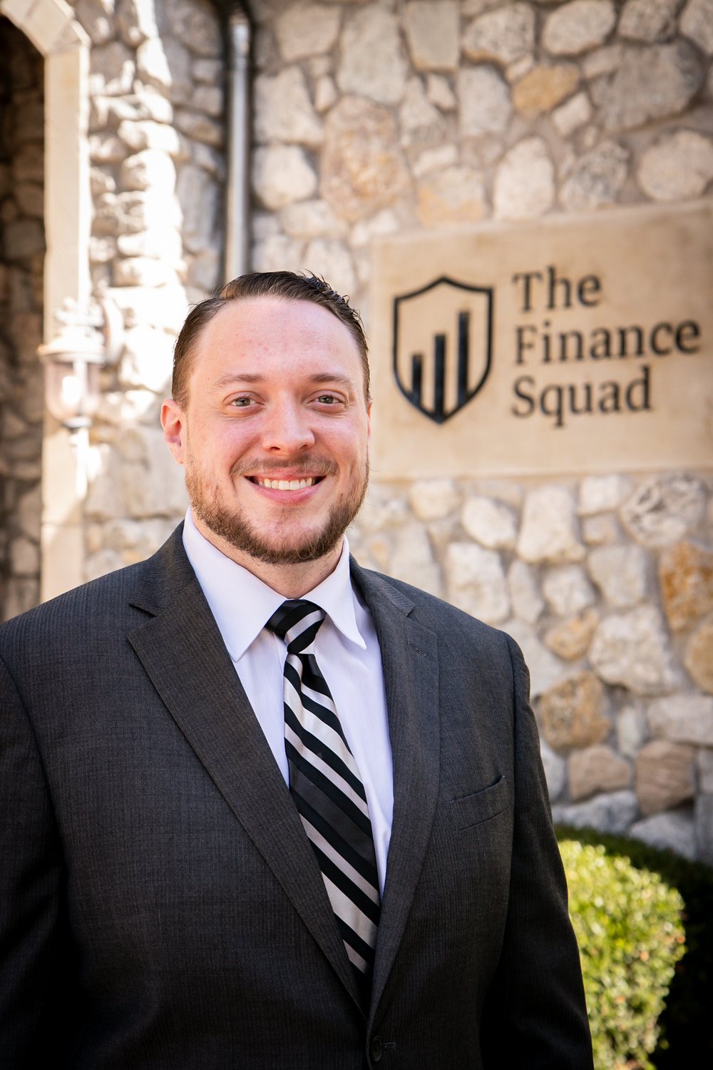 Curtis Humphries, CAS Associate at The Finance Squad, outside the McKinney office