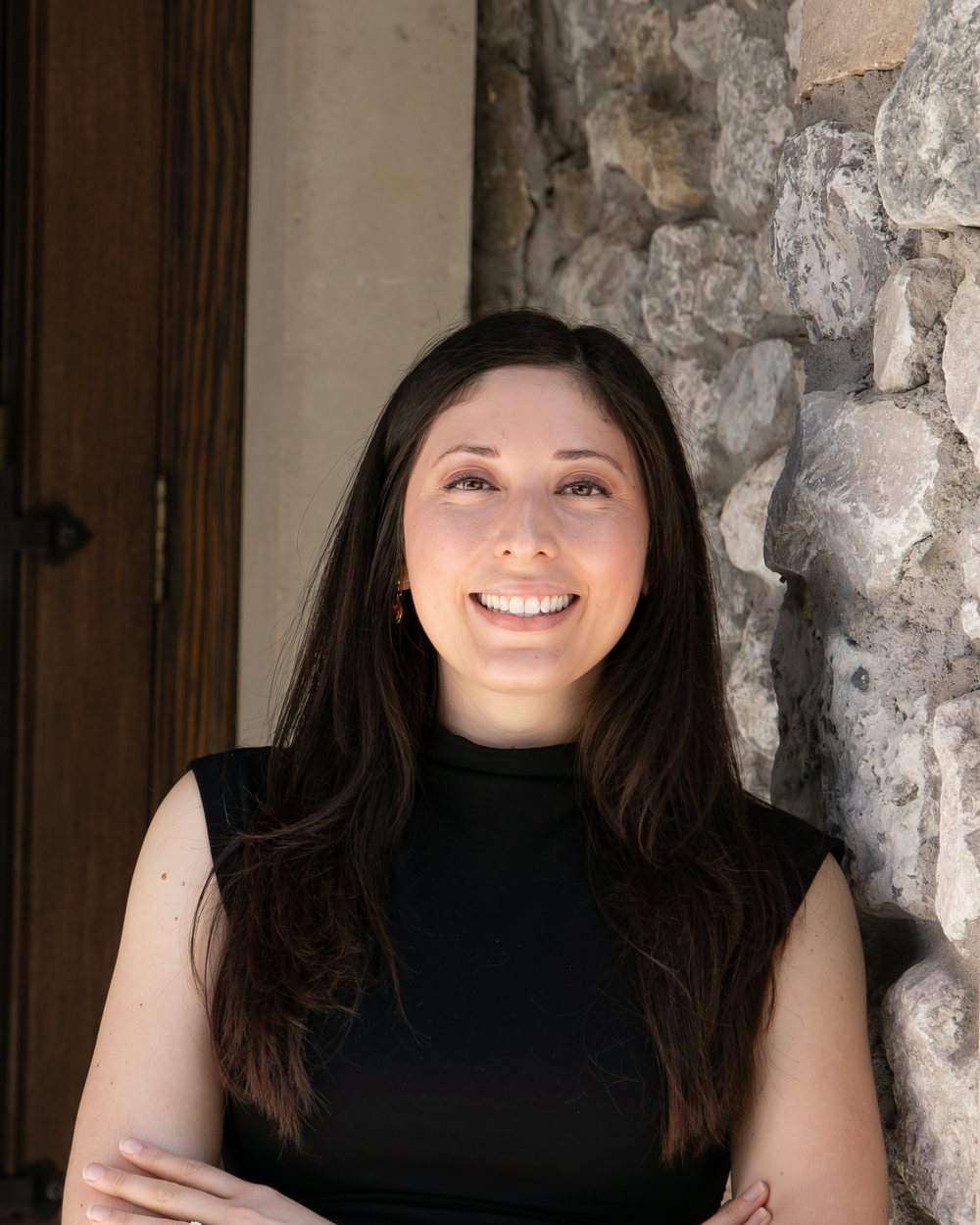 Katie Mansur, CAS Associate at The Finance Squad, at the office entrance