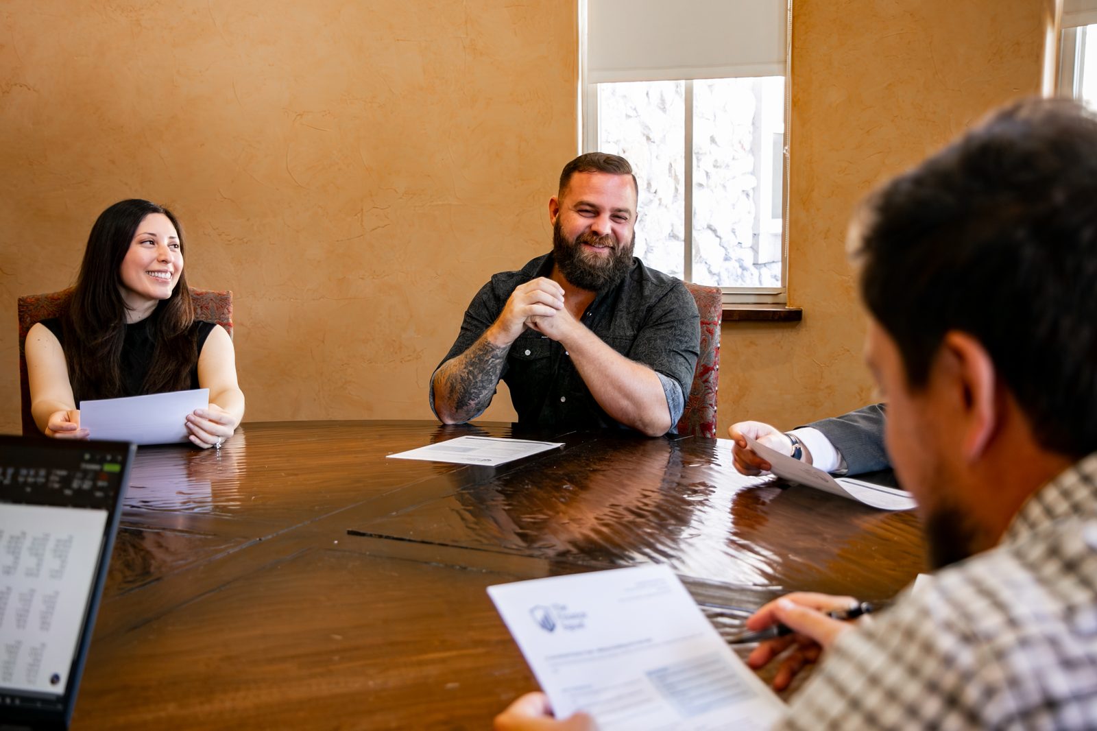 A kickoff meeting around the conference table at The Finance Squad office